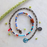 handmade friendship bracelets with colors of blue red amber and clear beads