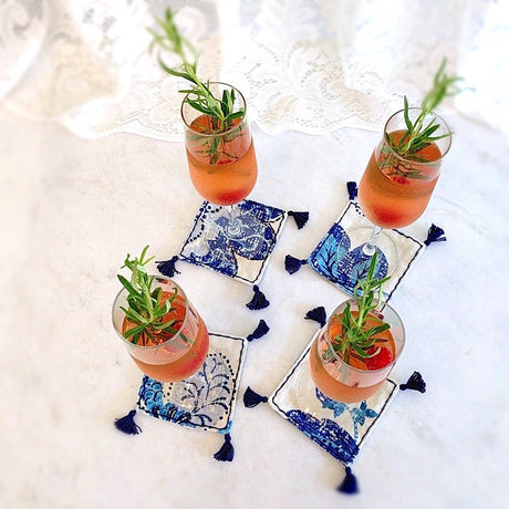 4 square boho in royal blue and ivory heavy linen colored coasters - top down view