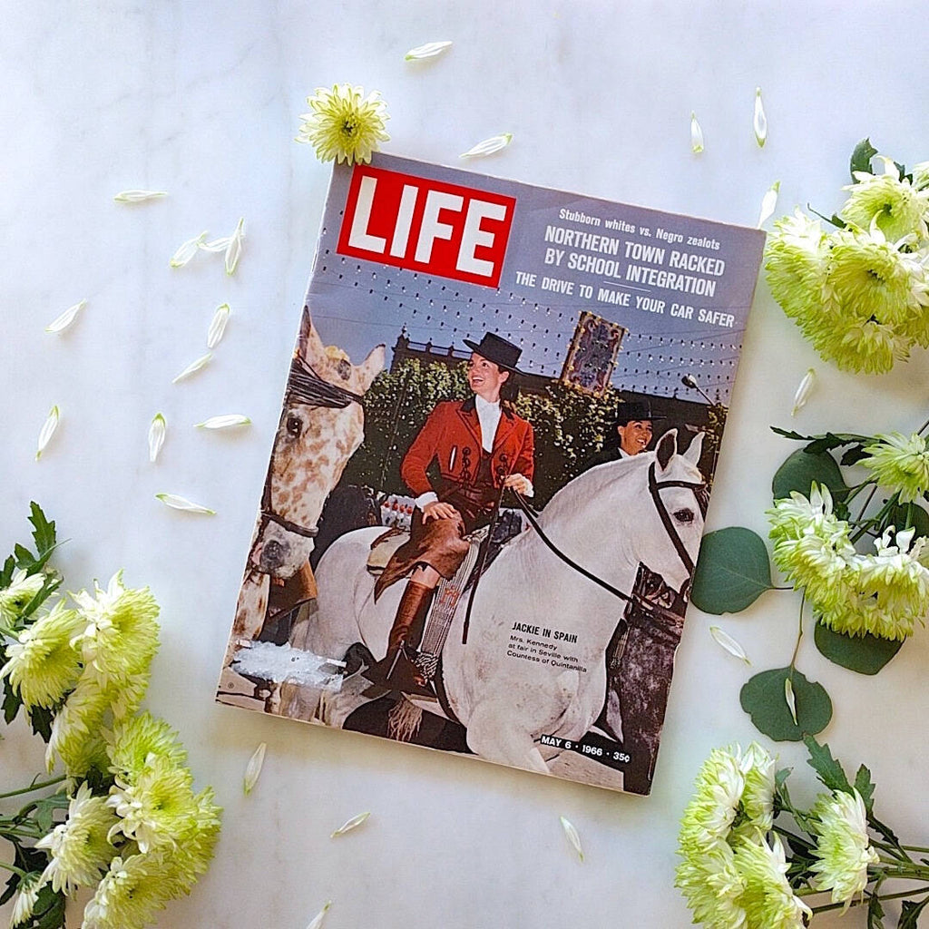 life magazine from may 1966 showing Jacqueline Kennedy on a white horse