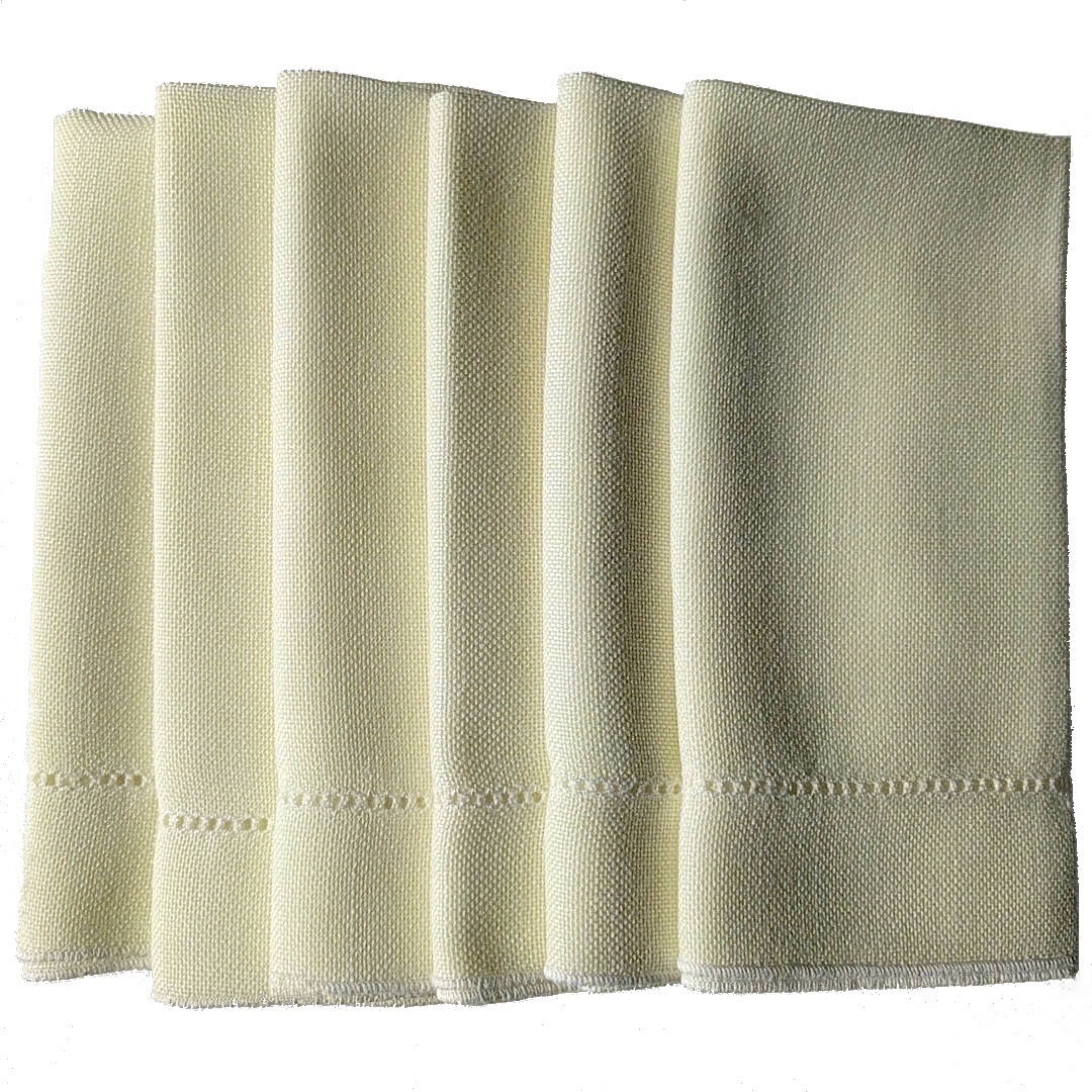 set of six champagne colored square fine linen napkins