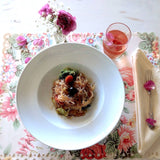 ornate and elegant cotton placemats for outdoor and indoor use shown with table setting and plate of food (2)