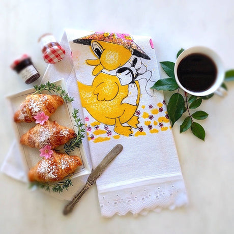 tea towel shown with cafe de manha theme
