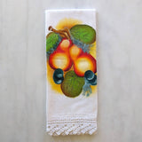 white cotton tea towel with pear motif and a white hand crocheted border