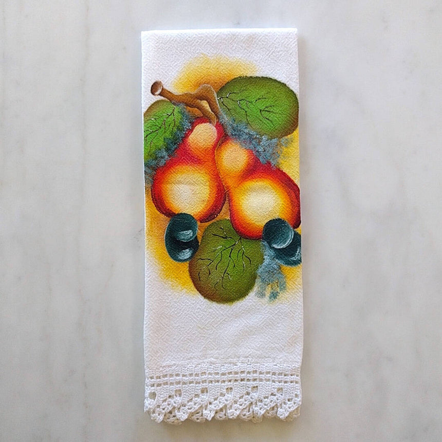 white cotton tea towel with pear motif and a white hand crocheted border