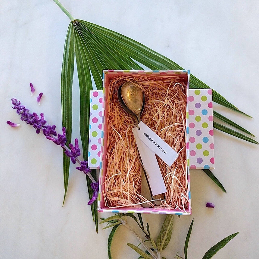 antique silver plated teaspoons from 1930s shown inside open gift box