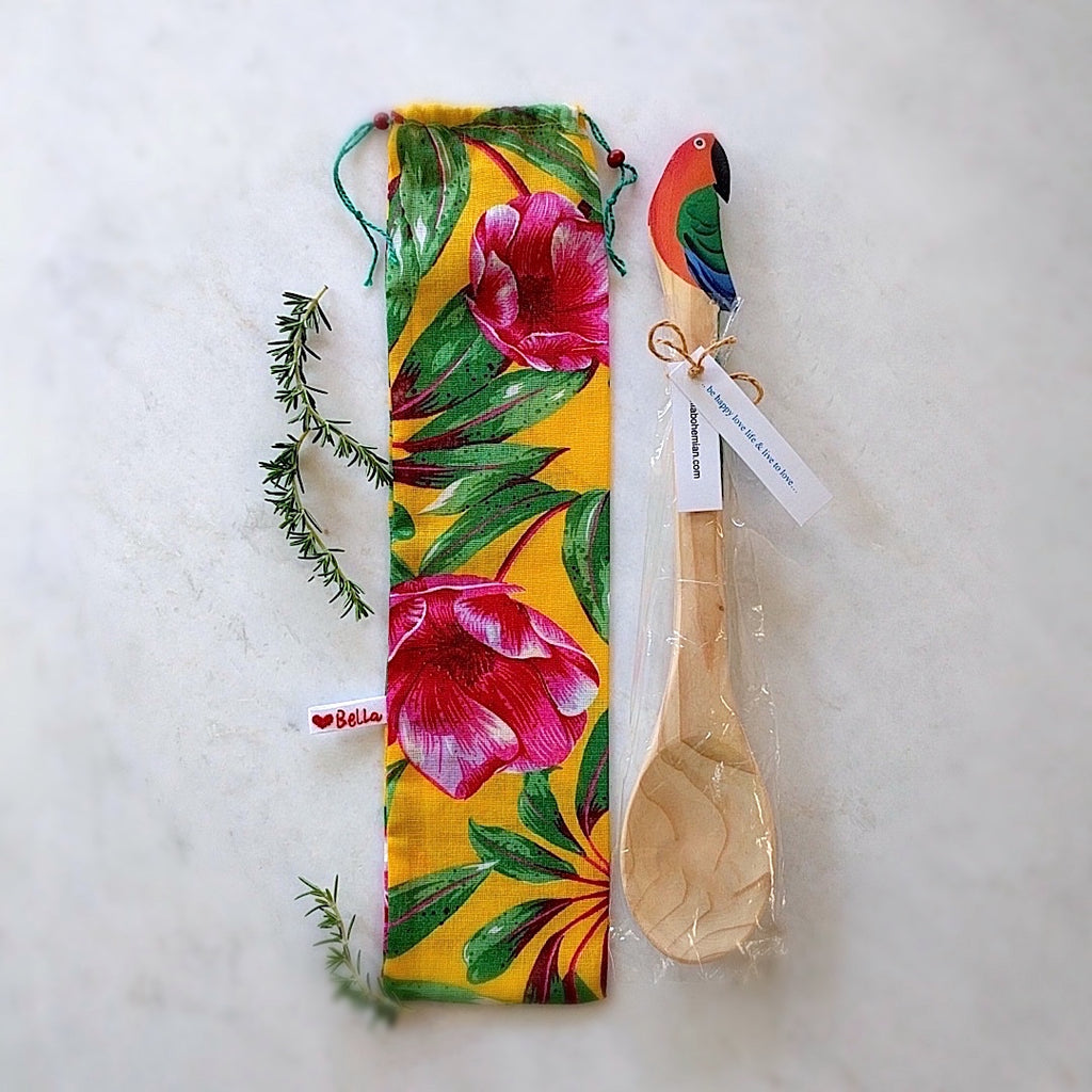 brazilian wood spoon with parrot head here shown with tropics themed gift bag