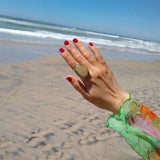 top down view of agate adjustable cocktail ring shown on a lady's hand