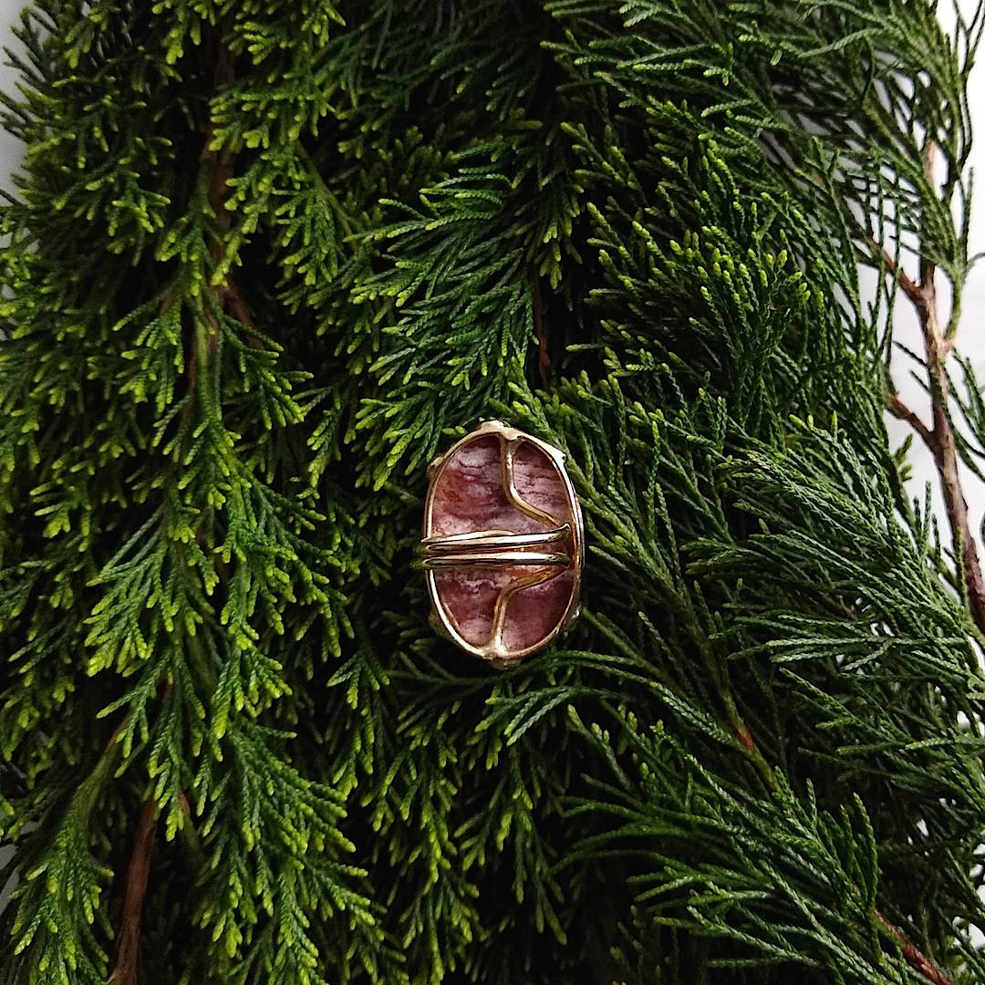 bottom view of oval zebra Jasper gold-plated adjustable cocktail ring
