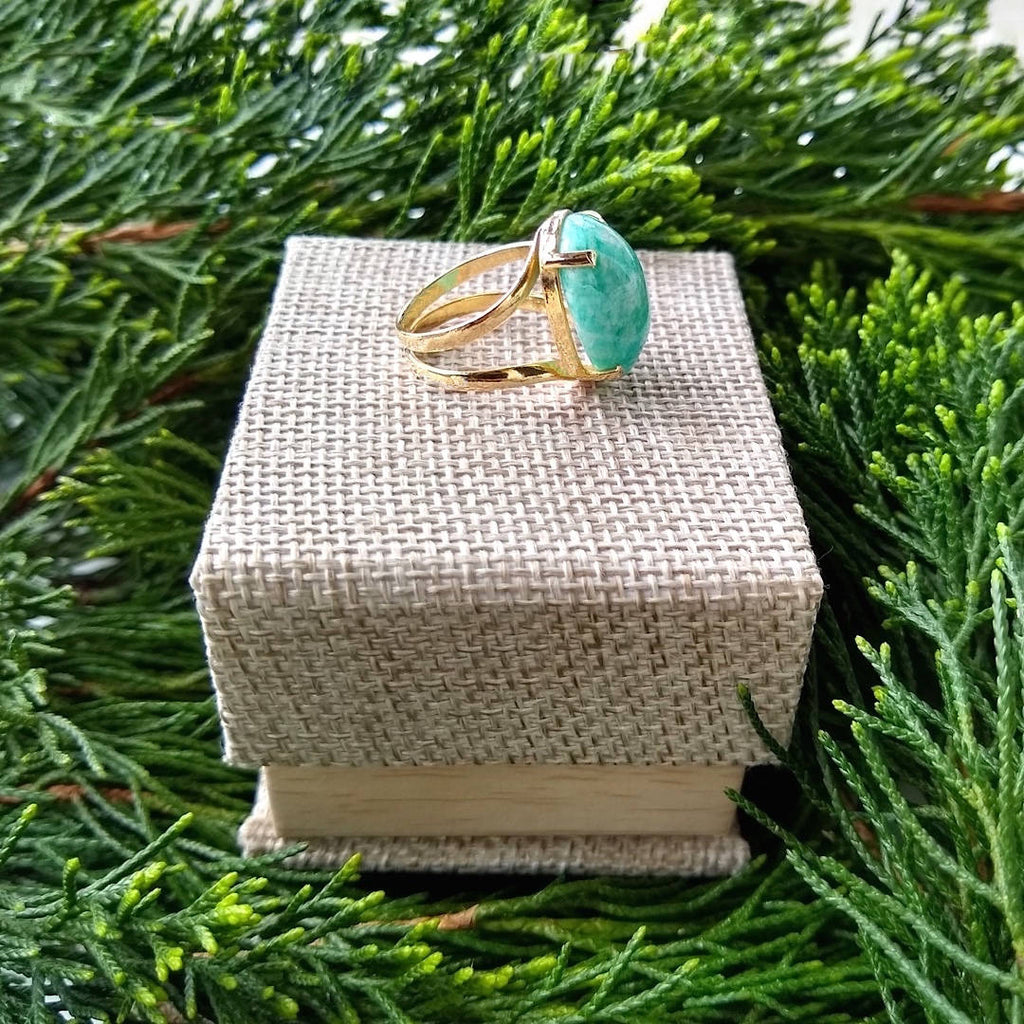 oval amazonite ring sitting on top of gift box