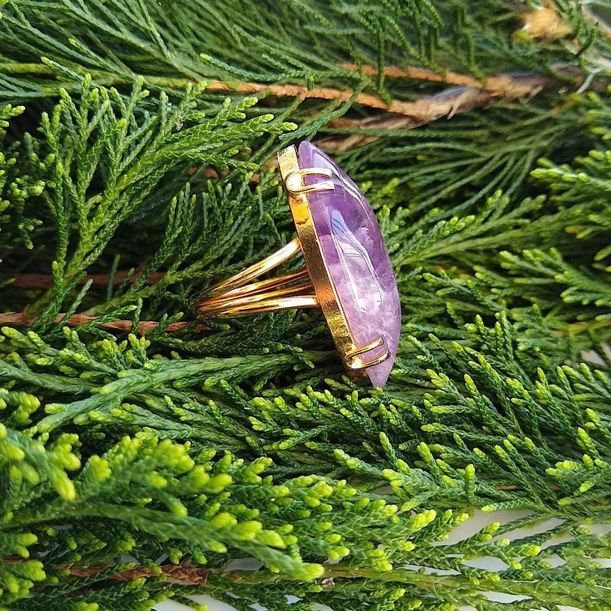 side view of marquise cut amethyst adjustable cocktail ring