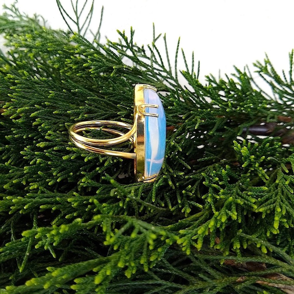 side view of large oval Moonstone gold-plated adjustable cocktail ring