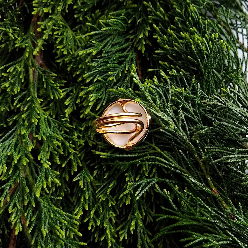 bottom view of round Milky Crystal cocktail ring