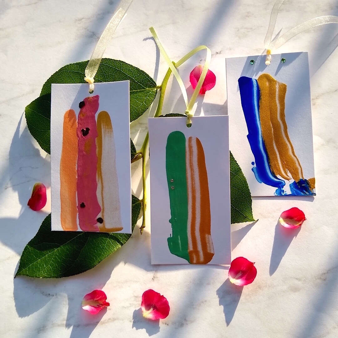 showing 3 of the colorful gift tags
