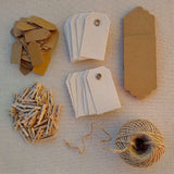 Kraft gift tags, cotton canvas tags, scalloped gift tags, jute twine, wood clothespins, different flat layout