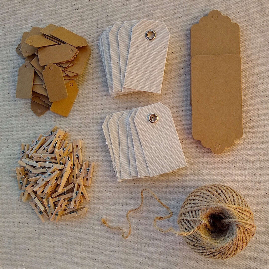 Kraft gift tags, cotton canvas tags, scalloped gift tags, jute twine, wood clothespins, different flat layout