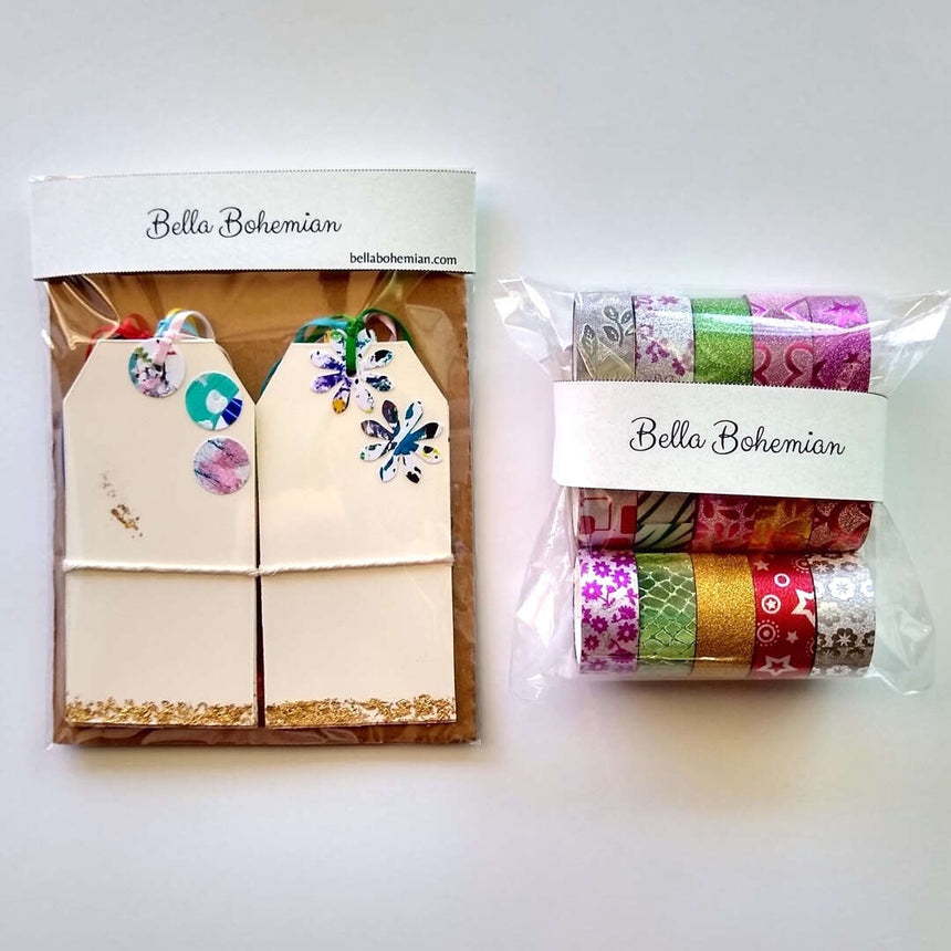 packages of 10 festive gift tags and 15 rolls of Washi tapes
