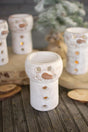 set of 4 clay snowman luminaries