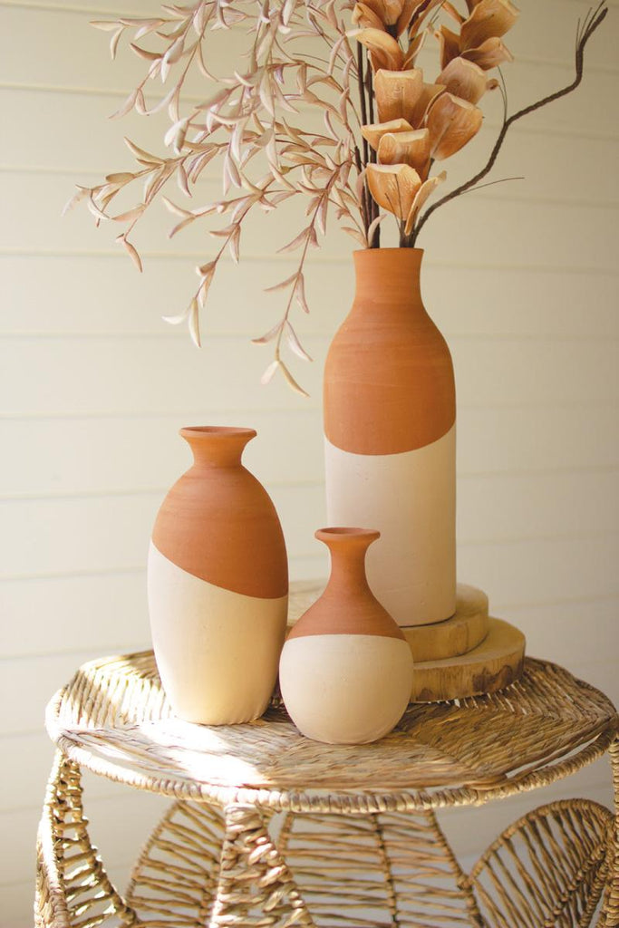 set of 3 ivory dipped clay vases of different sizes and shapes - front right view