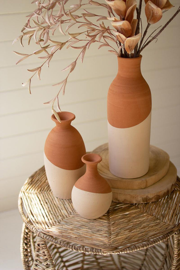 set of 3 ivory dipped clay vases of different sizes and shapes - elevated front right view