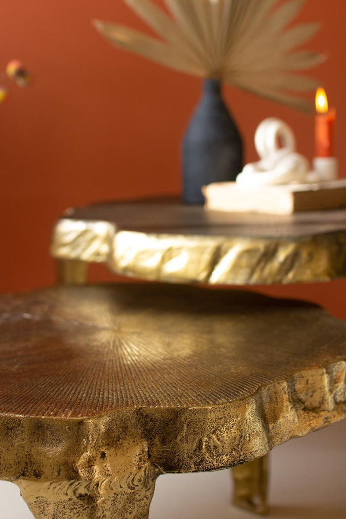 close-up of smaller brass finish table
