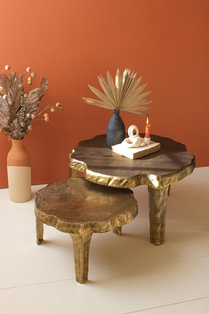 two nested brass finish tables