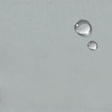 close-up of slipcover fabric - water resistance shown by pearls of water