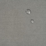 close-up of slipcover fabric - water resistance shown by pearls of water