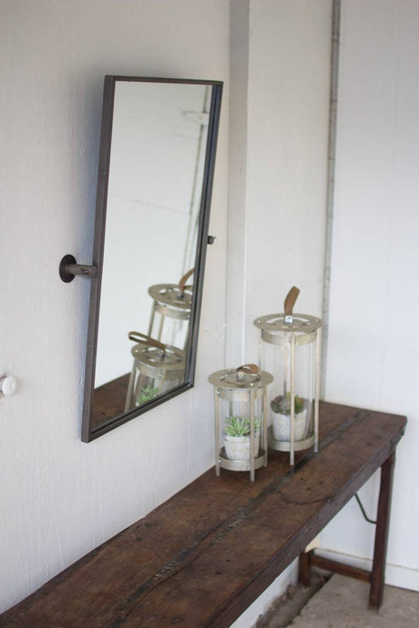 tilting metal wall mirror