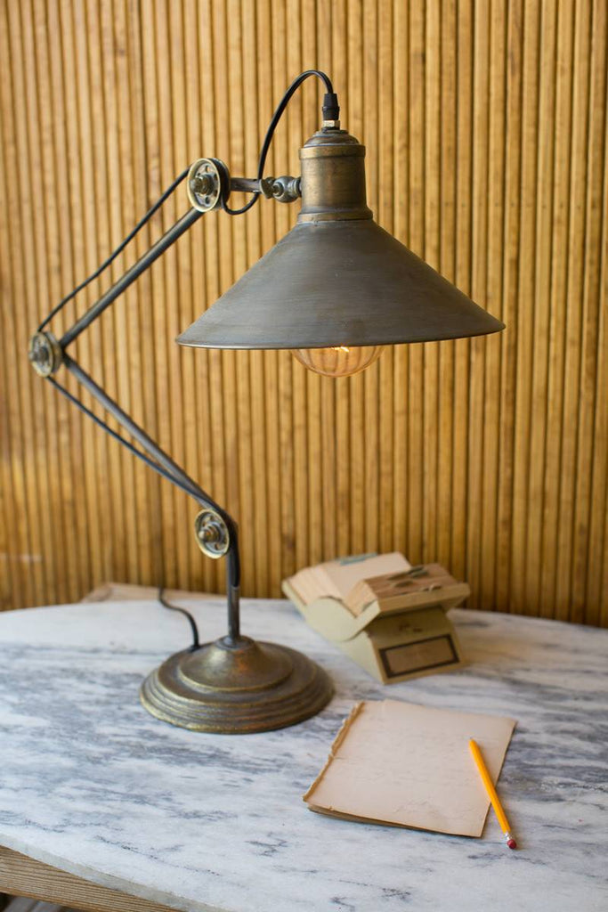 metal table lamp with pulleys as cable guides