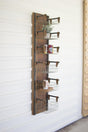 tall rustic dark wood and metal shelf rack with wire baskets