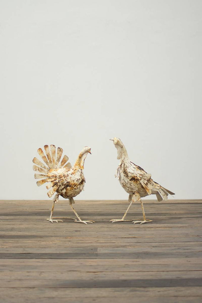 white metal turkeys seen from another vantage point