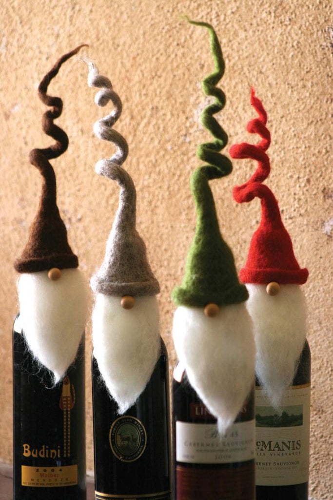 4 felt santa wine toppers with curly hats