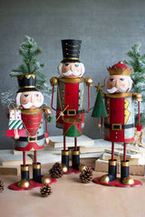 3 painted metal nutcrackers