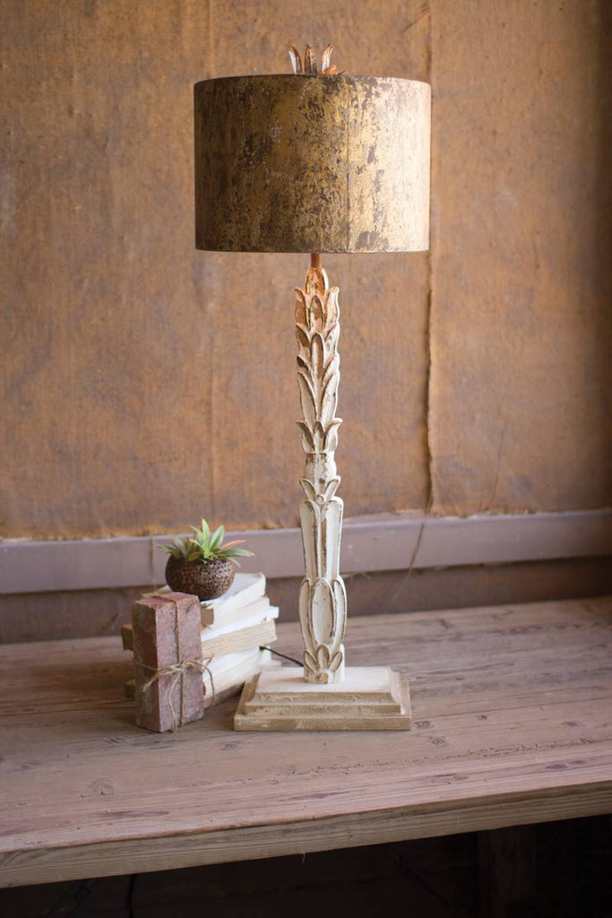 carved wooden base lamp with antique metal shade