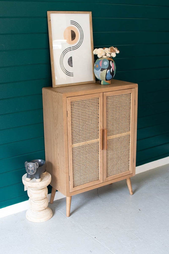 wooden cabinet with cane doors